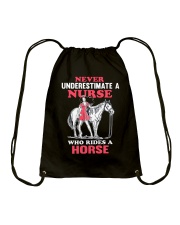 Never Underestimate A Nurse Drawstring Bag tile