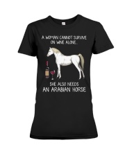 A Woman Cannot Survive On Wine Alone Premium Fit Ladies Tee tile