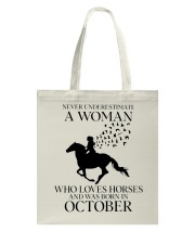 Never Underestimate A Woman Tote Bag tile