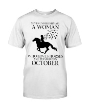 Never Underestimate A Woman Premium Fit Mens Tee tile