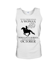 Never Underestimate A Woman Unisex Tank tile