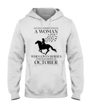 Never Underestimate A Woman Hooded Sweatshirt tile