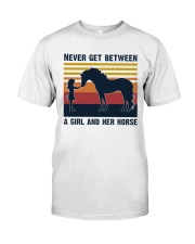 Never get between a girl and her horse Classic T-Shirt tile