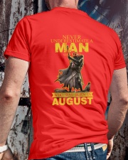 NEVER UNDERESTIMATE A MAN OF FAITH - AUGUST Classic T-Shirt lifestyle-mens-crewneck-back-2
