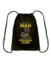 NEVER UNDERESTIMATE A MAN OF FAITH - JUNE Drawstring Bag thumbnail