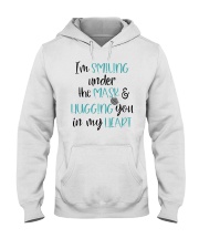 I am smiling under the mask and hugging you Hooded Sweatshirt tile