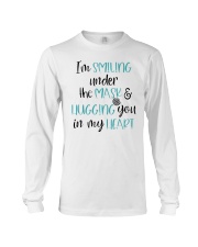 I am smiling under the mask and hugging you Long Sleeve Tee tile