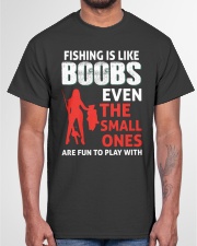 Fishing Is Like Boobs Even The Small Ones Are Fun To Play With Humor Fishing Girl Holding A Big Fish Classic T-Shirt garment-tshirt-unisex-front-03