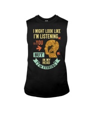 I Might Look Like Im Listening To You Sleeveless Tee tile