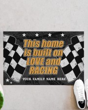 This home is built on love and racing Doormat 22.5" x 15" aos-doormat-22-5x15-lifestyle-front-06