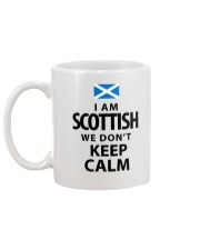 WE DON'T KEEP CALM Mug back