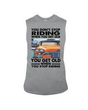 taxi driver riding Sleeveless Tee tile