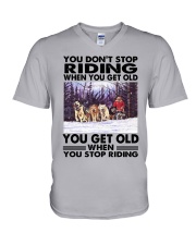 sled dog racing riding V-Neck T-Shirt tile