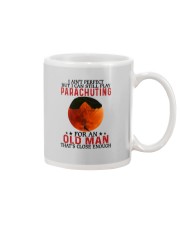 parachuting pefect olm Mug tile
