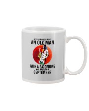 09 saxophone old man never Mug tile