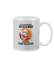Stamp collecting old man Mug tile