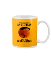 parachuting old man Mug tile
