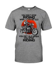 biker riding Premium Fit Mens Tee tile