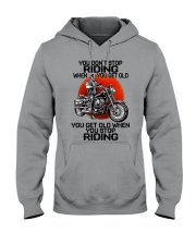 biker riding Hooded Sweatshirt tile