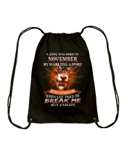 A King Was Born In November Drawstring Bag tile