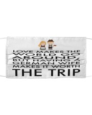 LOVE MAKES THE WORLD GO AROUND Cloth face mask front