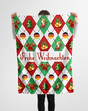 FROHE WEIHNACHTEN GERMAN CHRISTMAS Small Fleece Blanket - 30" x 40" aos-coral-fleece-blanket-30x40-lifestyle-front-14