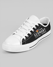 TEAM GERMANY LIFETIME MEMBER Men's Low Top White Shoes aos-men-low-top-shoes-ghosted-white-outside-left-02