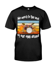 We march to the beat of our own drums Classic T-Shirt front