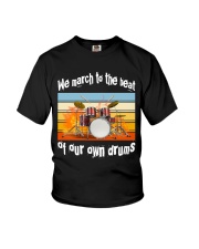 We march to the beat of our own drums Youth T-Shirt tile