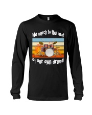 We march to the beat of our own drums Long Sleeve Tee tile