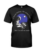 I'm still on earth Premium Fit Mens Tee thumbnail