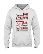 Never underestimate a teacher who does all things Hooded Sweatshirt front
